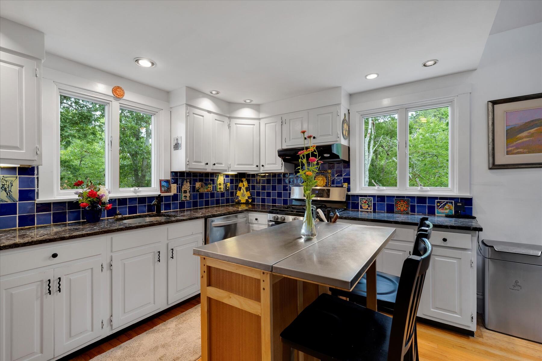 36 Cranberry Way Wellfleet, MA 02667 - Photo 13 of 64 a kitchen with sink cabinets and wooden floor