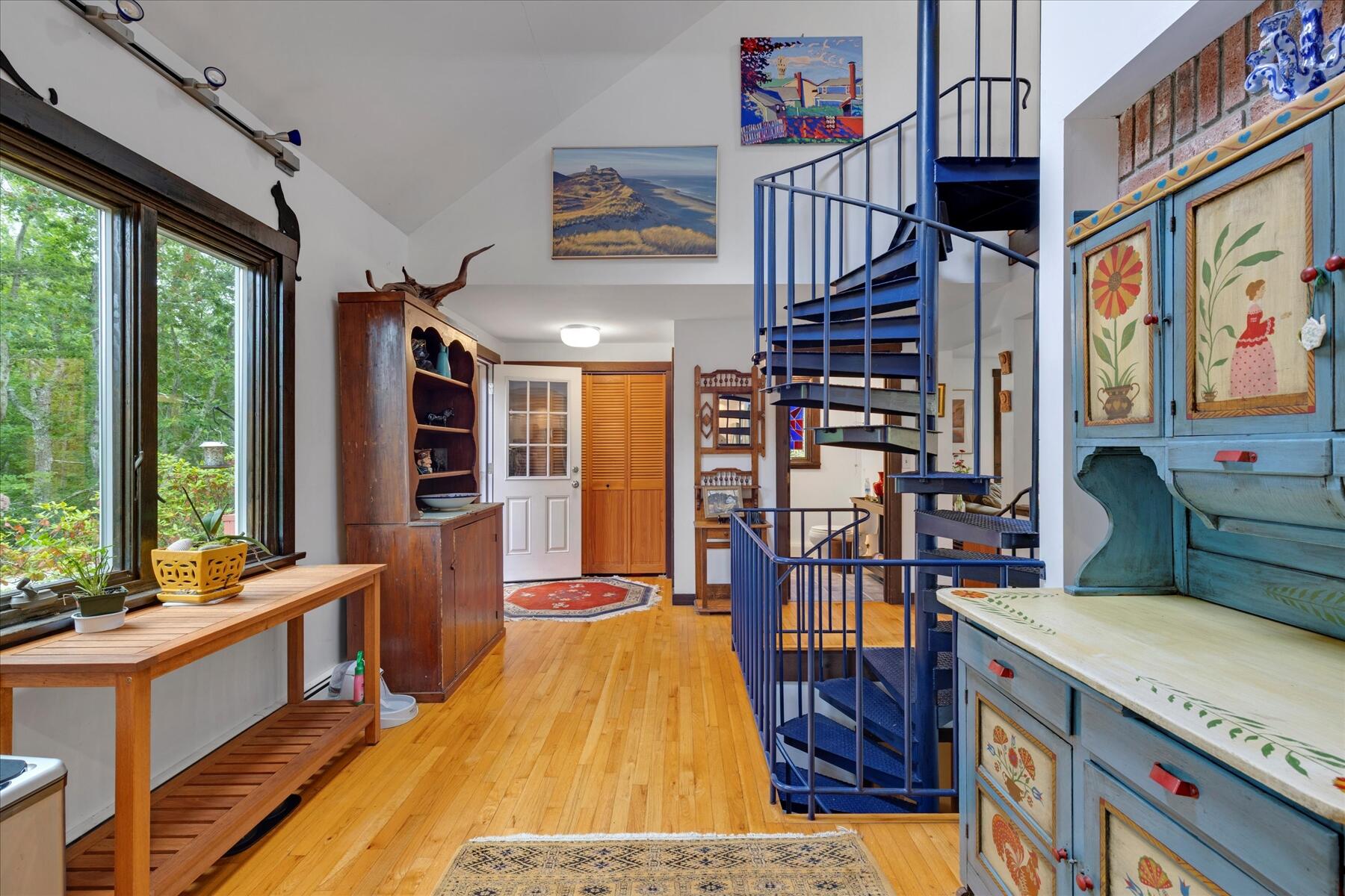 36 Cranberry Way Wellfleet, MA 02667 - Photo 14 of 64 a very nice looking room with kitchen view and a wooden floor
