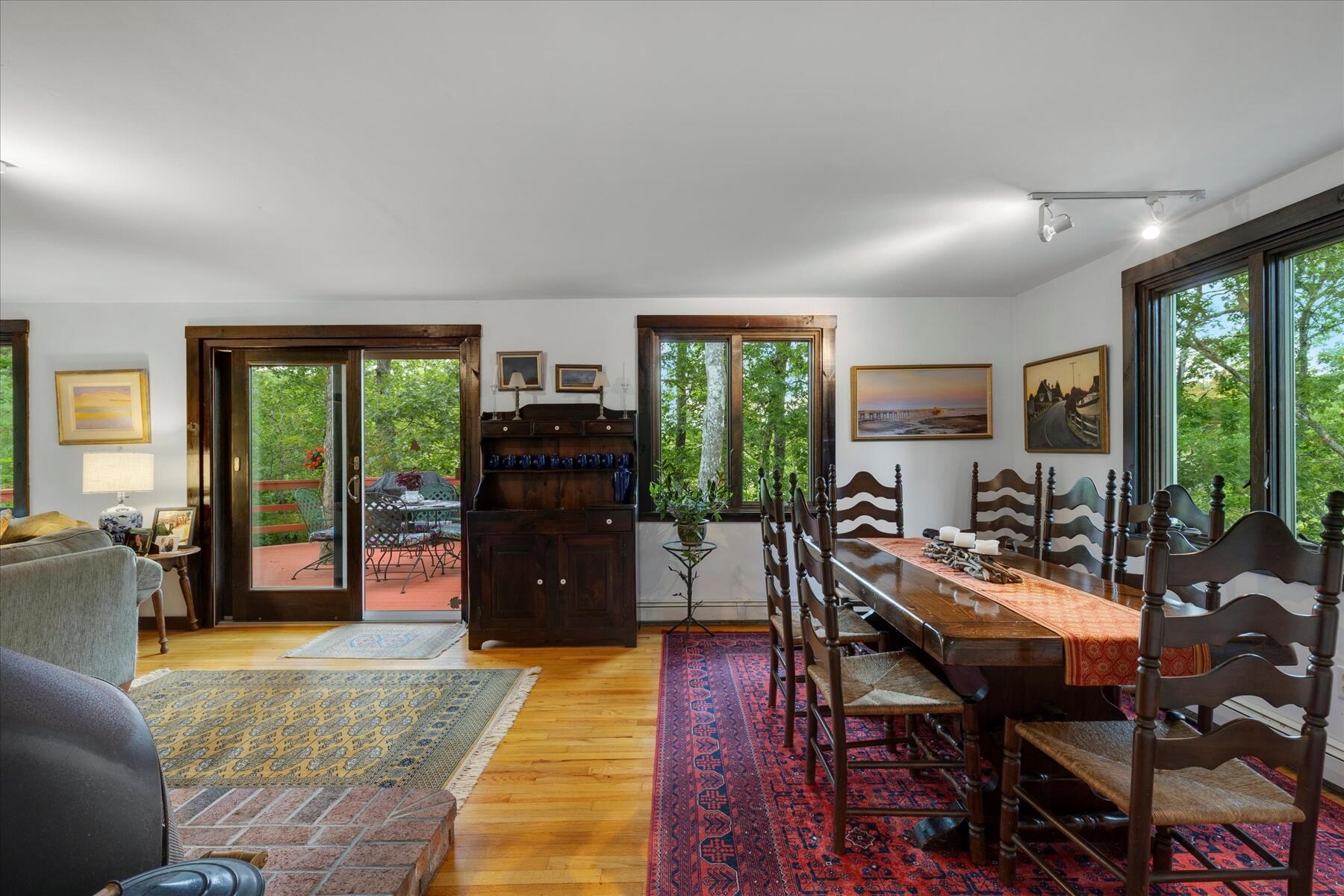 36 Cranberry Way Wellfleet, MA 02667 - Photo 15 of 64 a living room with furniture and large windows