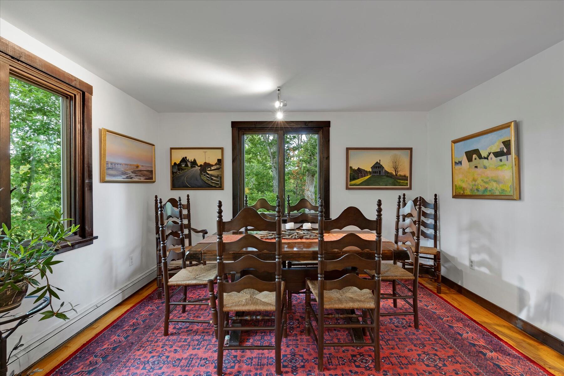 36 Cranberry Way Wellfleet, MA 02667 - Photo 16 of 64 a dining room with wooden floor and a rug