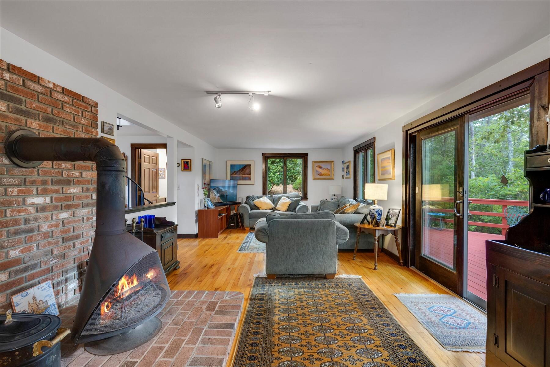 36 Cranberry Way Wellfleet, MA 02667 - Photo 17 of 64 a living room with fireplace furniture and a fireplace