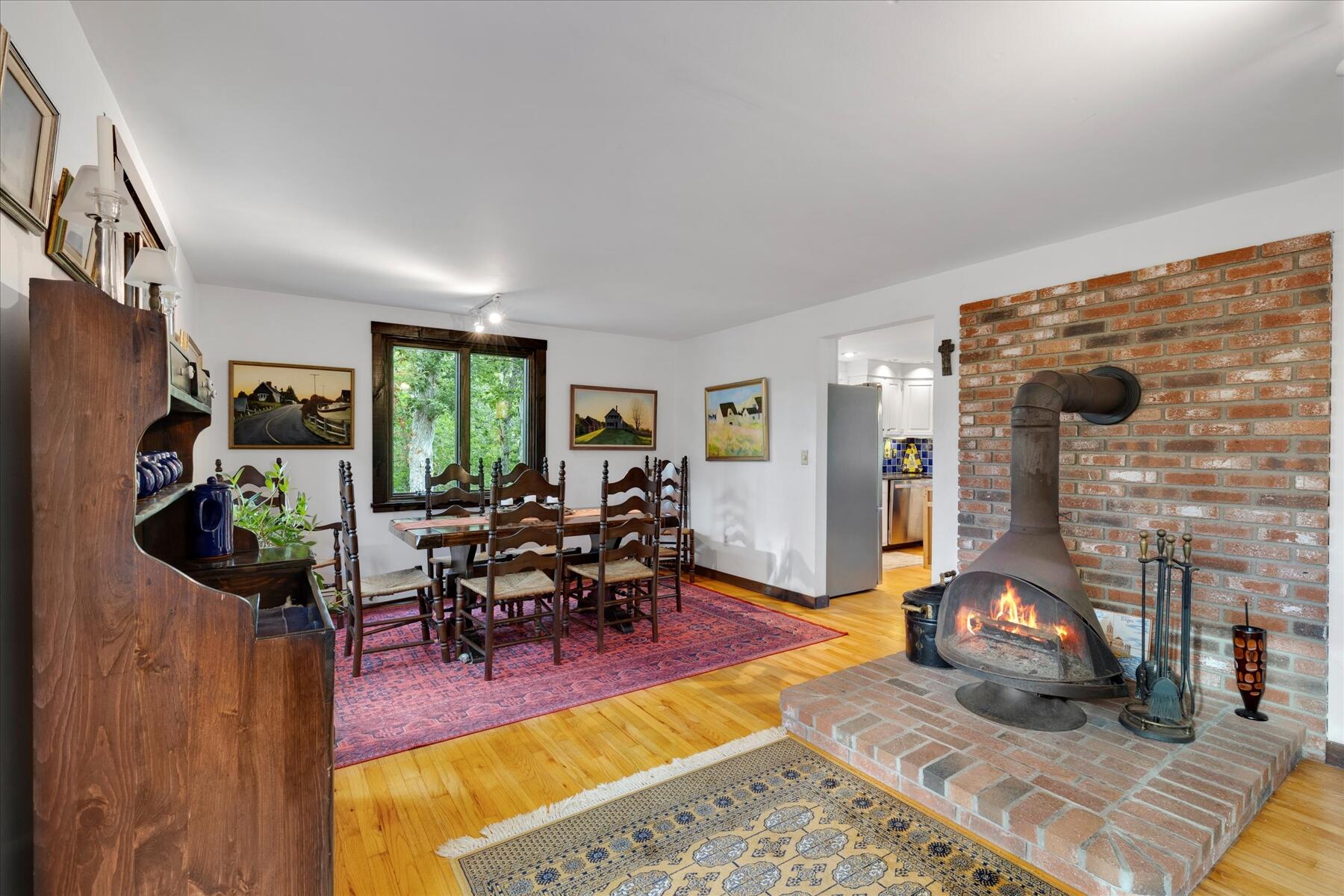 36 Cranberry Way Wellfleet, MA 02667 - Photo 18 of 64 a living room with furniture a rug and a floor to ceiling window