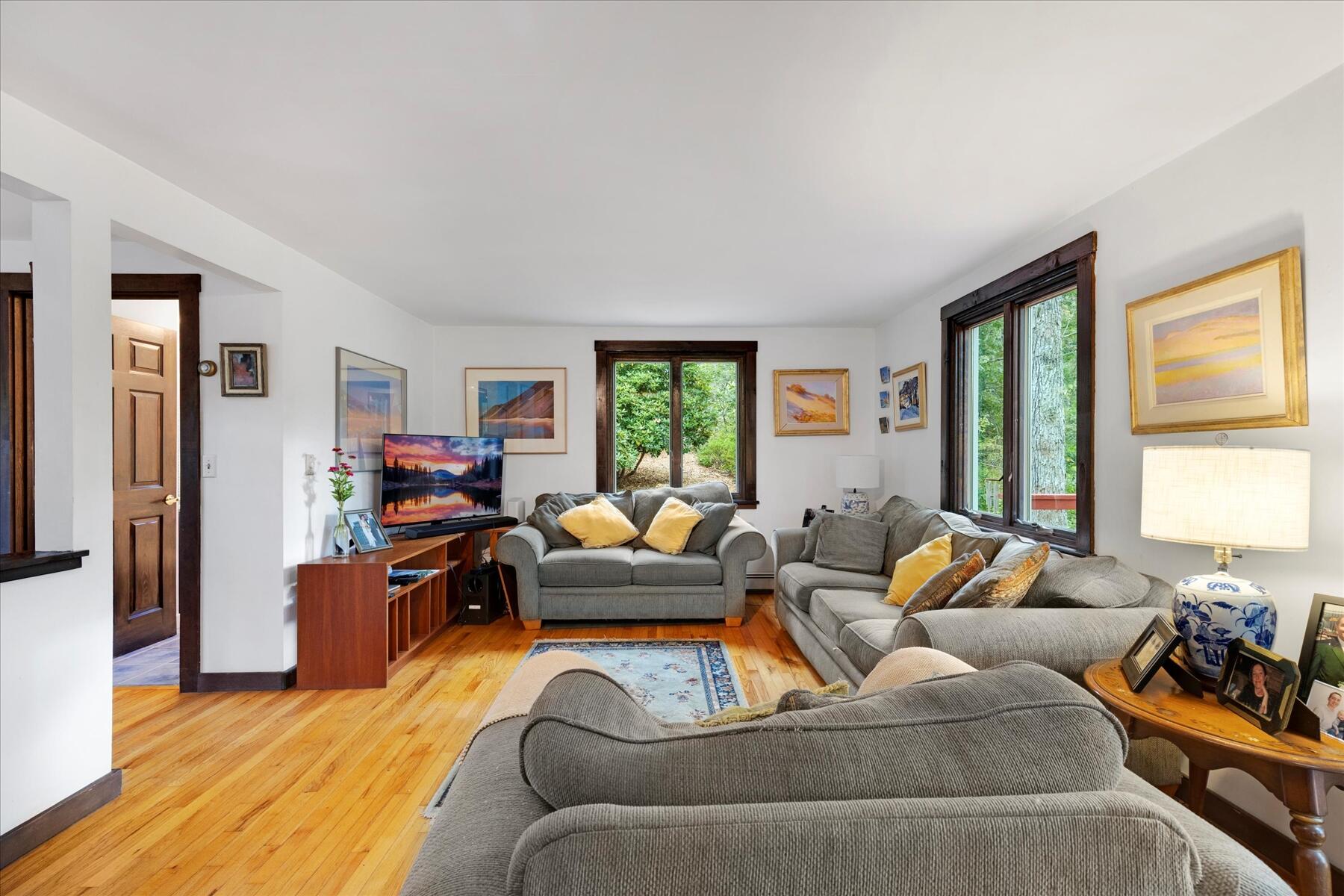 36 Cranberry Way Wellfleet, MA 02667 - Photo 19 of 64 a living room with furniture and a large window