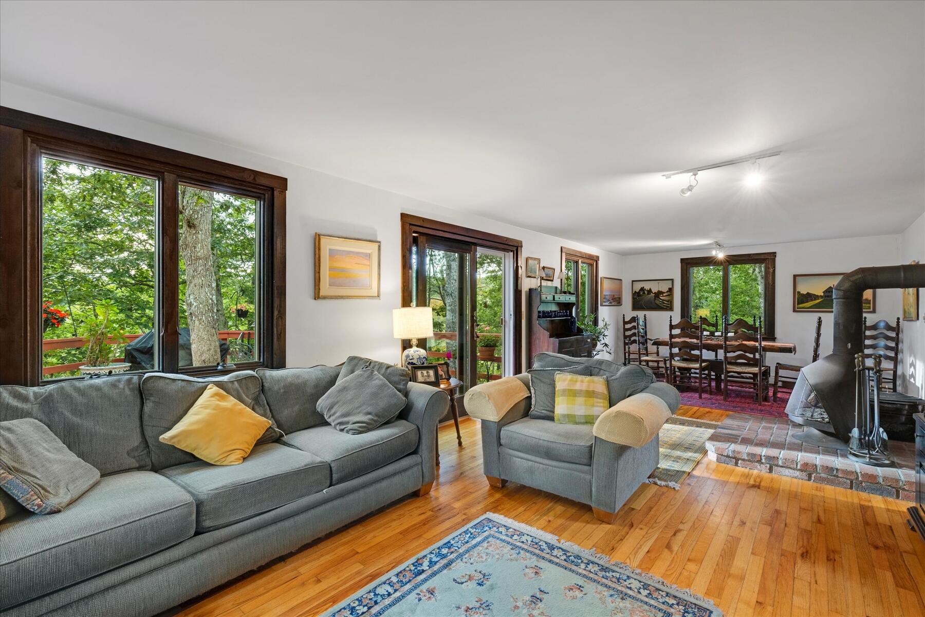 36 Cranberry Way Wellfleet, MA 02667 - Photo 21 of 64 a living room with furniture and a large window