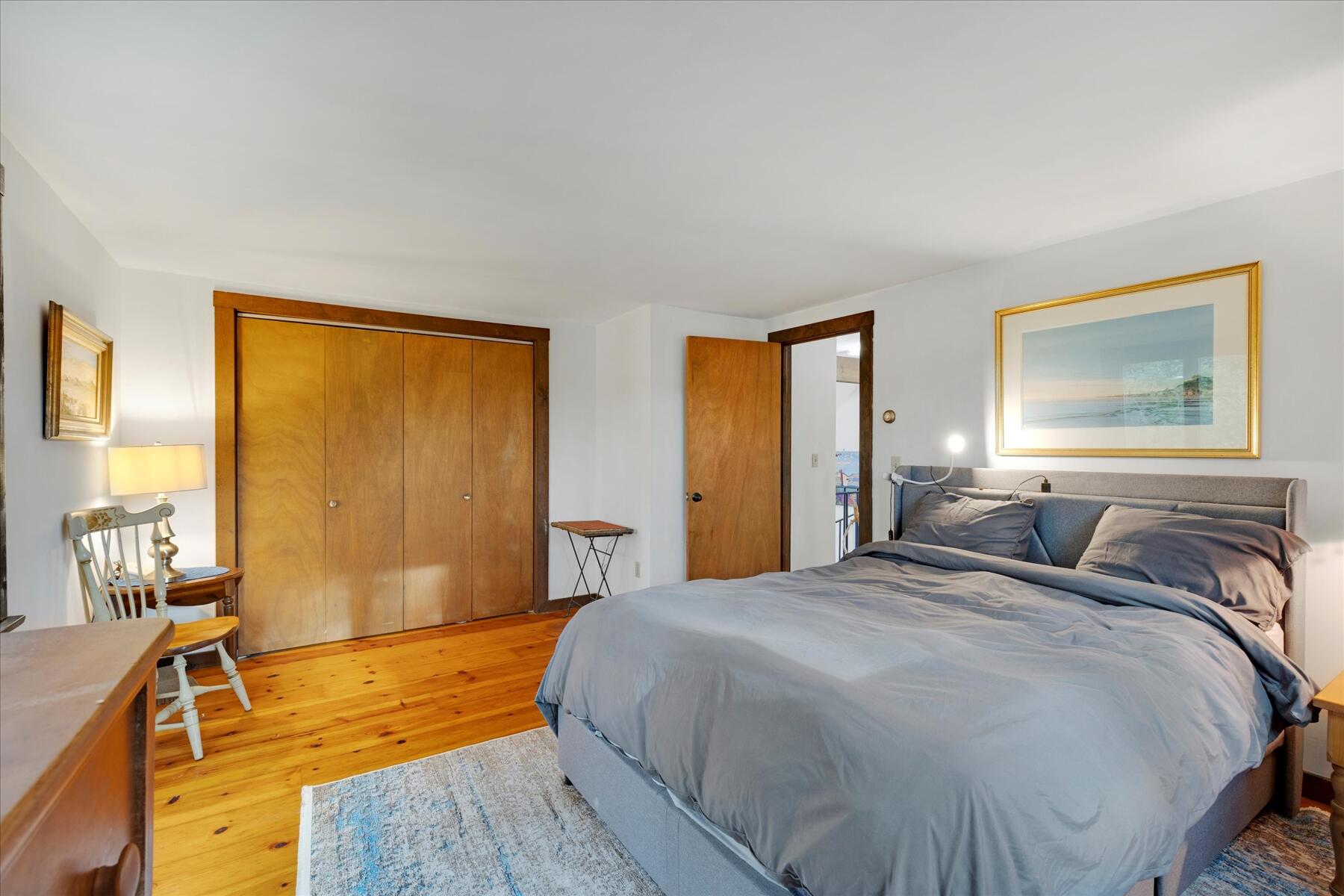 36 Cranberry Way Wellfleet, MA 02667 - Photo 29 of 64 a bedroom with a bed and a large window