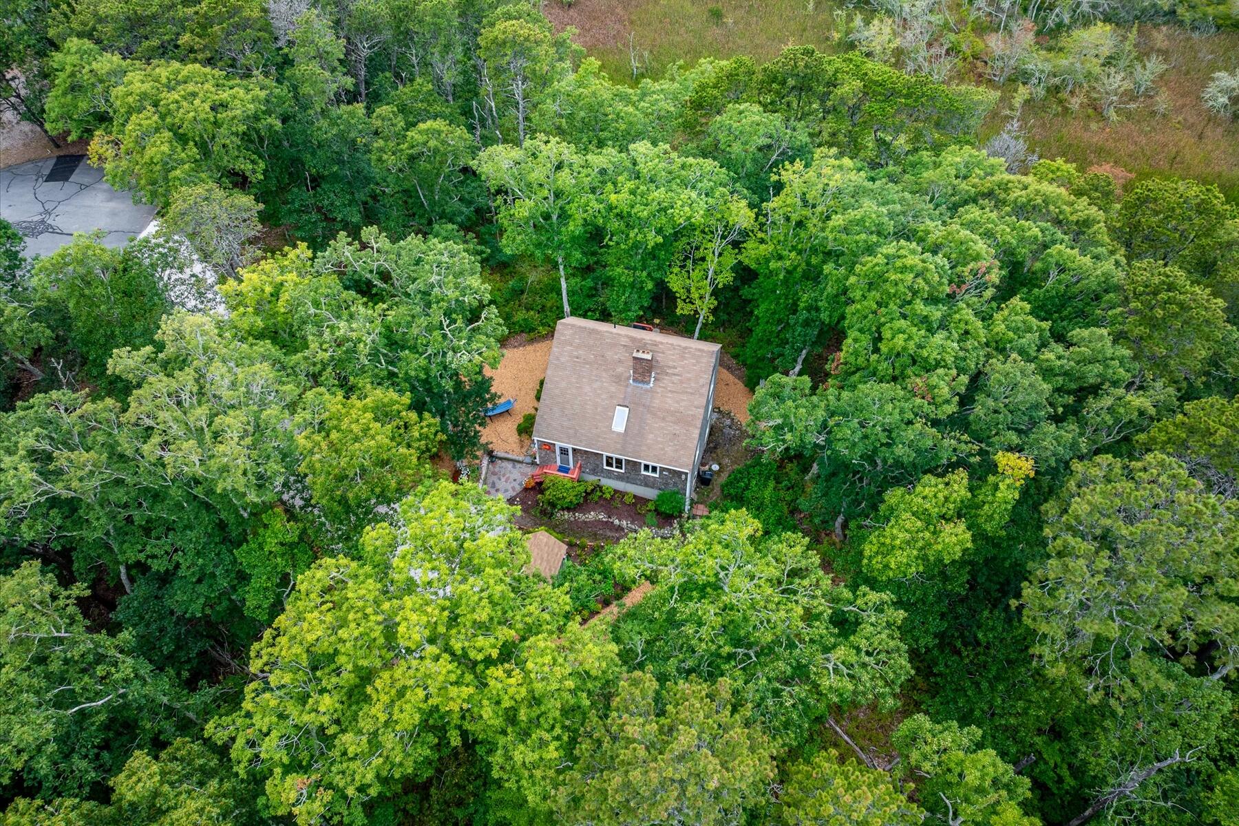 36 Cranberry Way Wellfleet, MA 02667 - Photo 51 of 64 an aerial view of a house with a yard and tree s