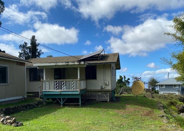 5702 Lower Kula Road Kula, HI 96790 - Photo 3 of 20 a view of a house with a yard and furniture