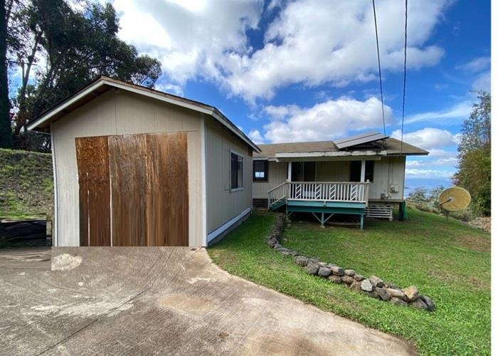 5702 Lower Kula Road Kula, HI 96790 - Photo 6 of 20 a backyard of a house with yard barbeque oven and outdoor seating
