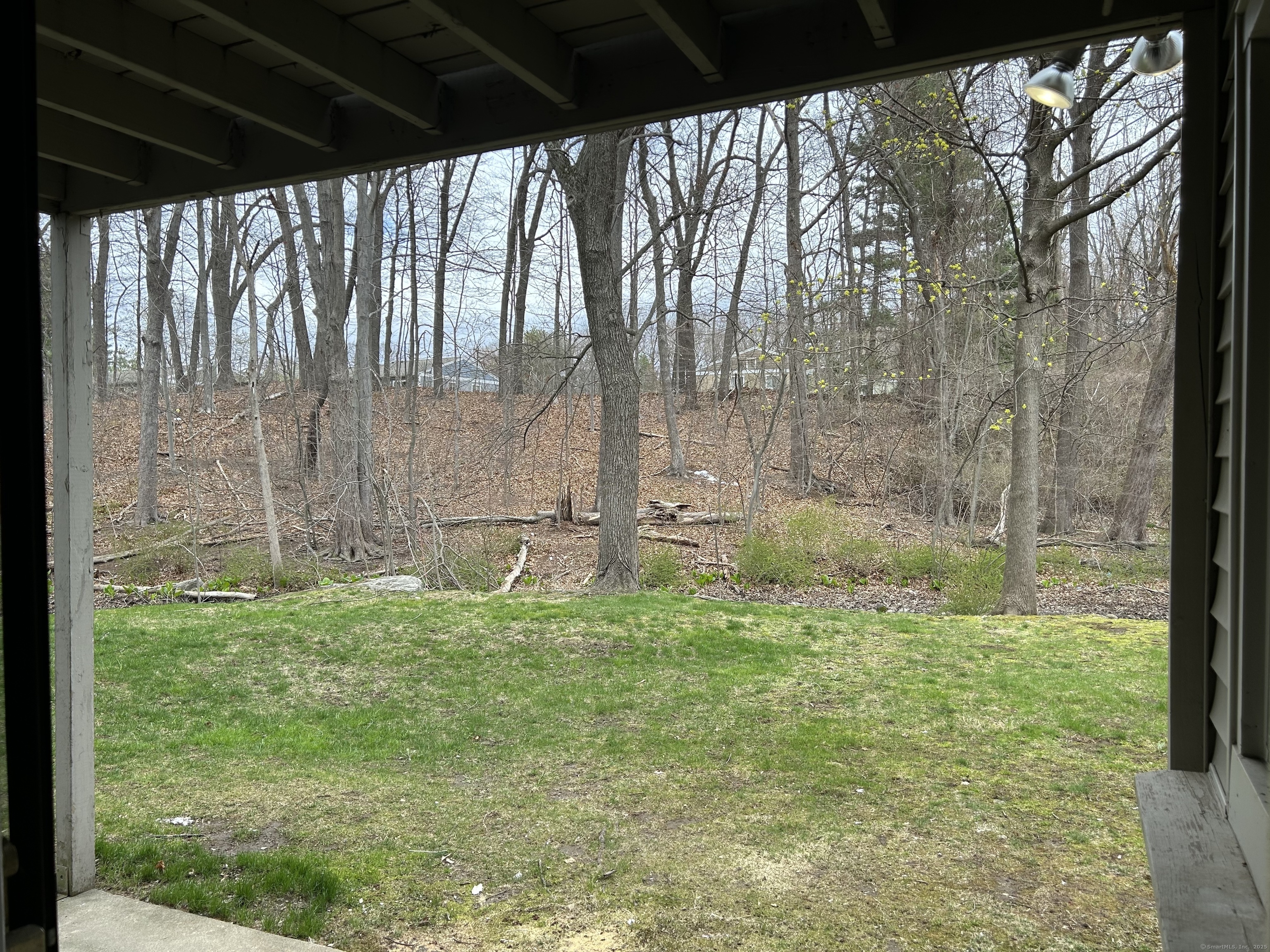 7 Padanaram Road, Unit J253 Danbury, CT 06811 - Photo 11 of 12 a bathroom with a bathtub