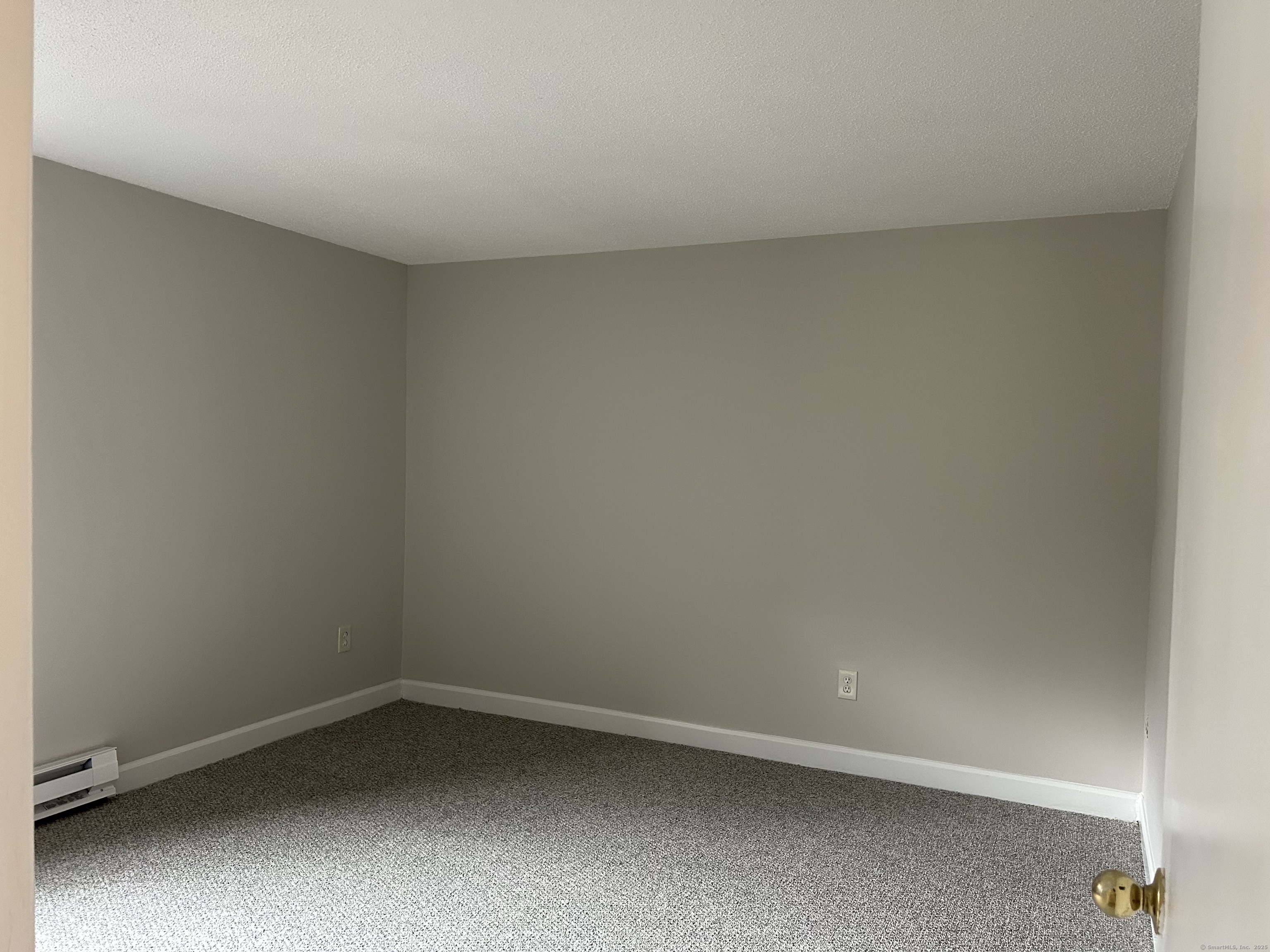 7 Padanaram Road, Unit J253 Danbury, CT 06811 - Photo 8 of 12 a view of an empty room