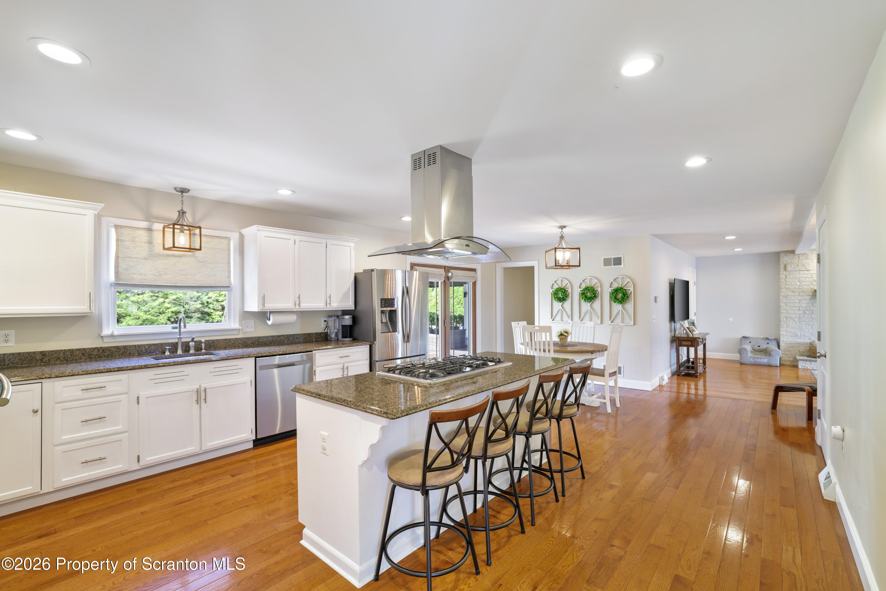 3 Old Mill Road Jermyn, PA 18433 - Photo 14 of 57 a view of a dining room with furniture window and wooden floor
