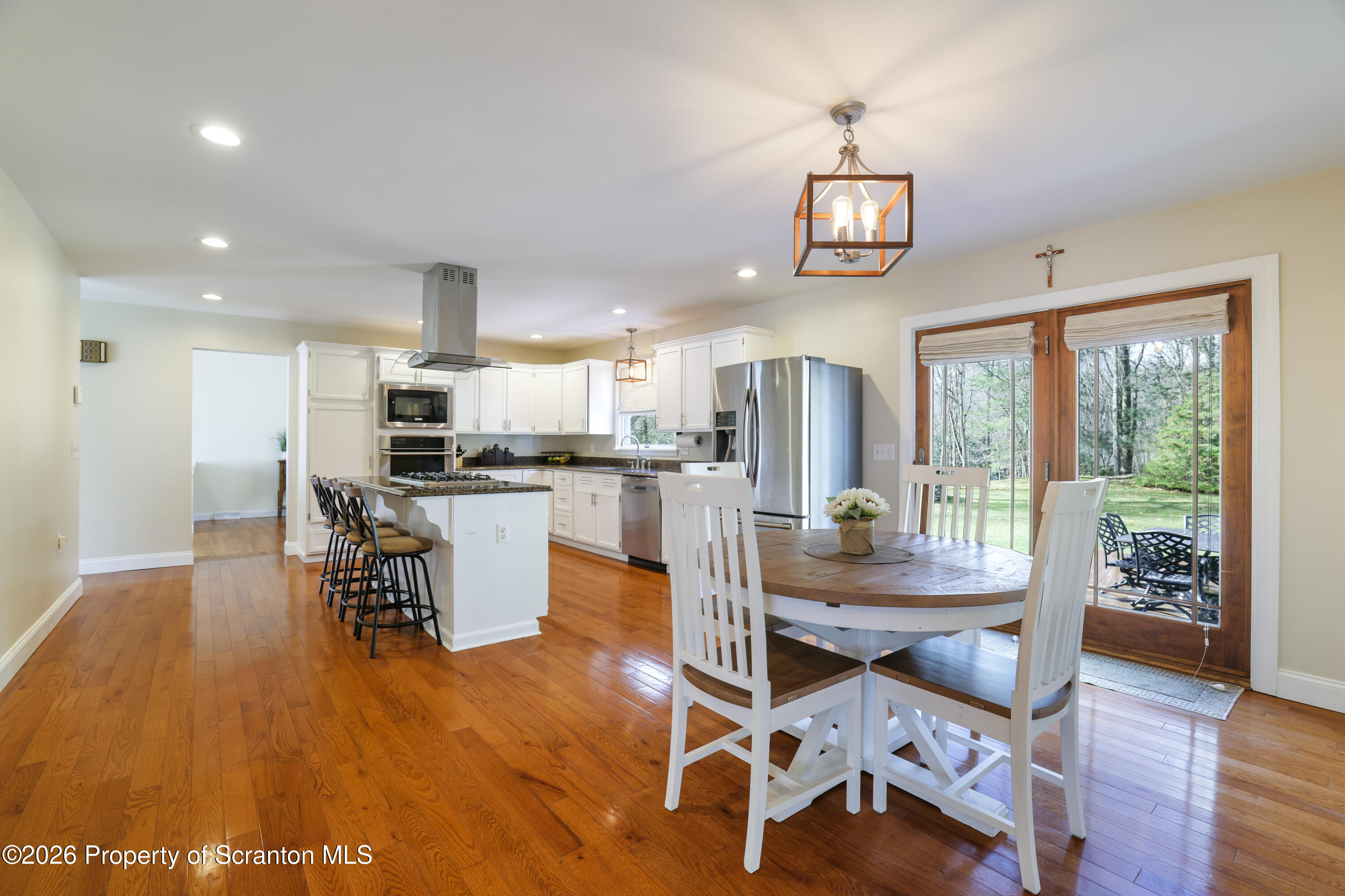 3 Old Mill Road Jermyn, PA 18433 - Photo 15 of 57 a dining room with furniture and wooden floor