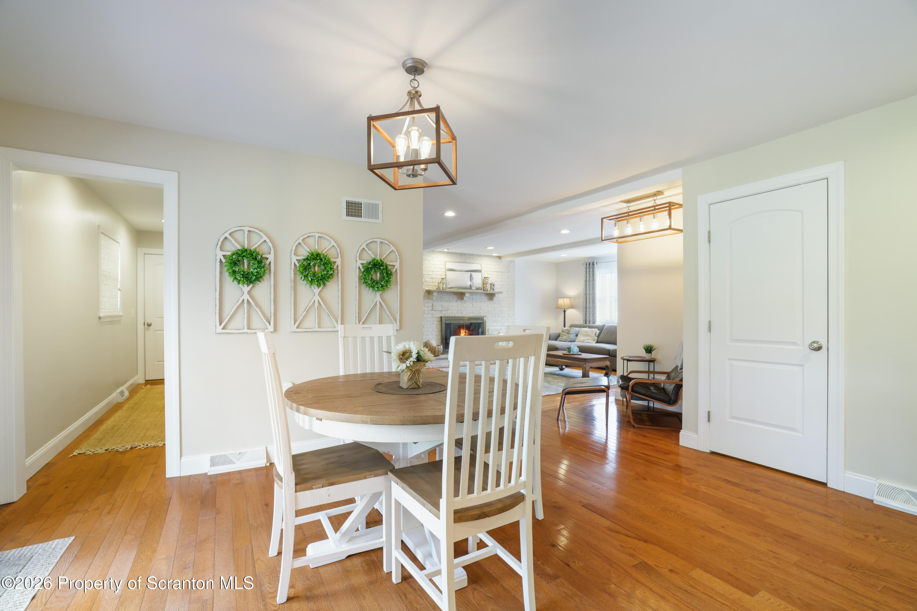 3 Old Mill Road Jermyn, PA 18433 - Photo 16 of 57 a view of a dining room with furniture wooden floor and chandelier