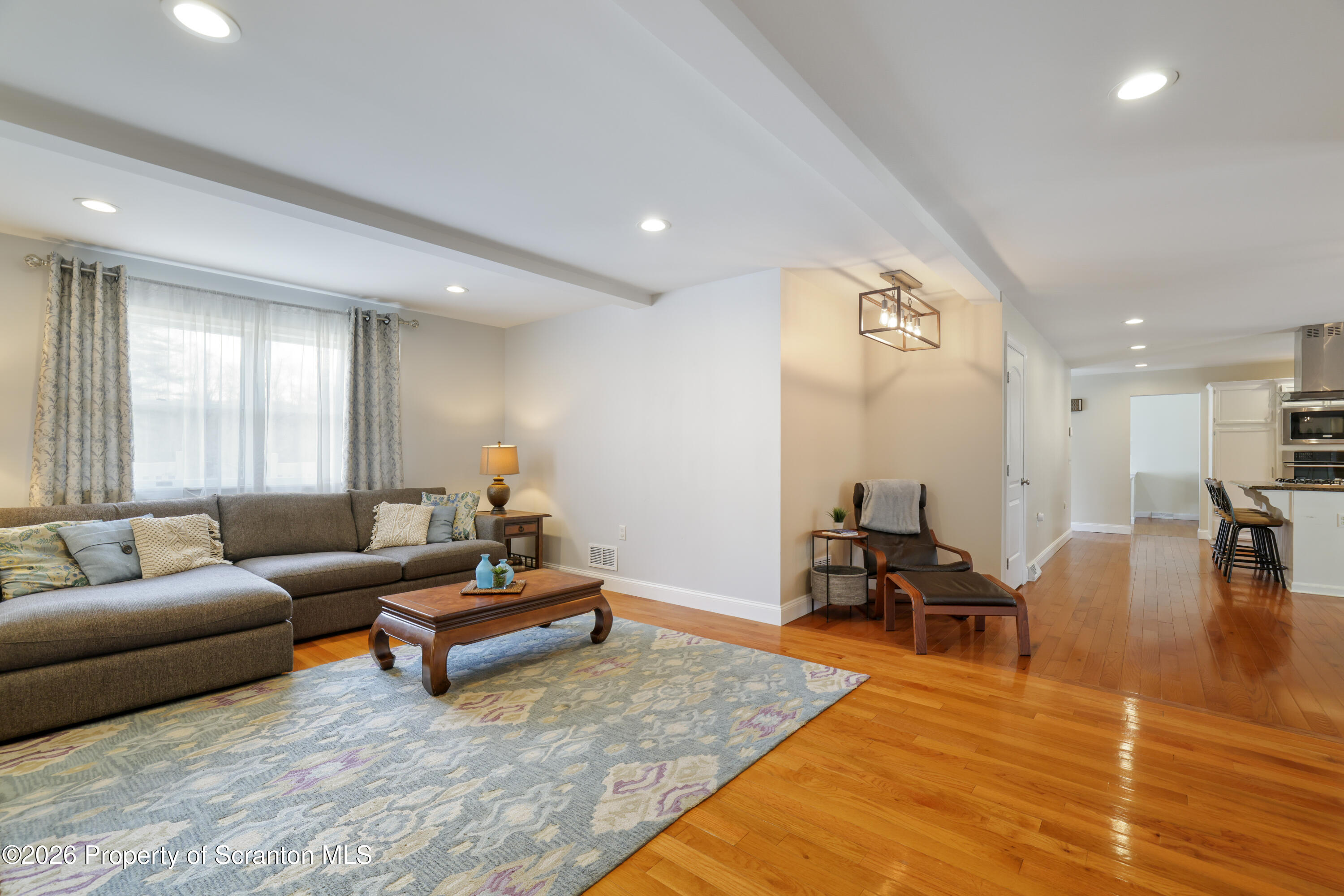 3 Old Mill Road Jermyn, PA 18433 - Photo 21 of 57 a living room with furniture and wooden floor
