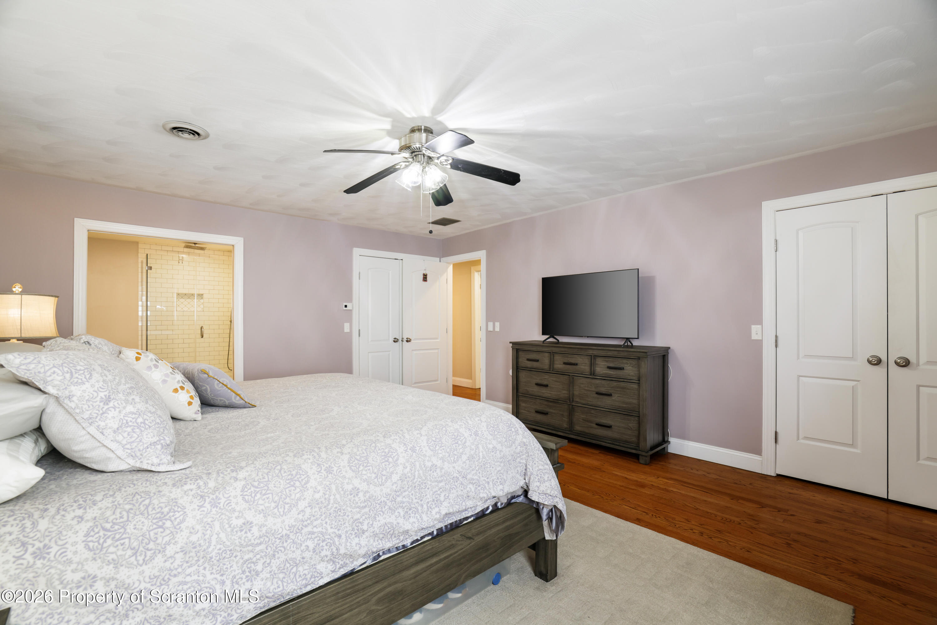 3 Old Mill Road Jermyn, PA 18433 - Photo 29 of 57 a bedroom with a bed and a flat screen tv