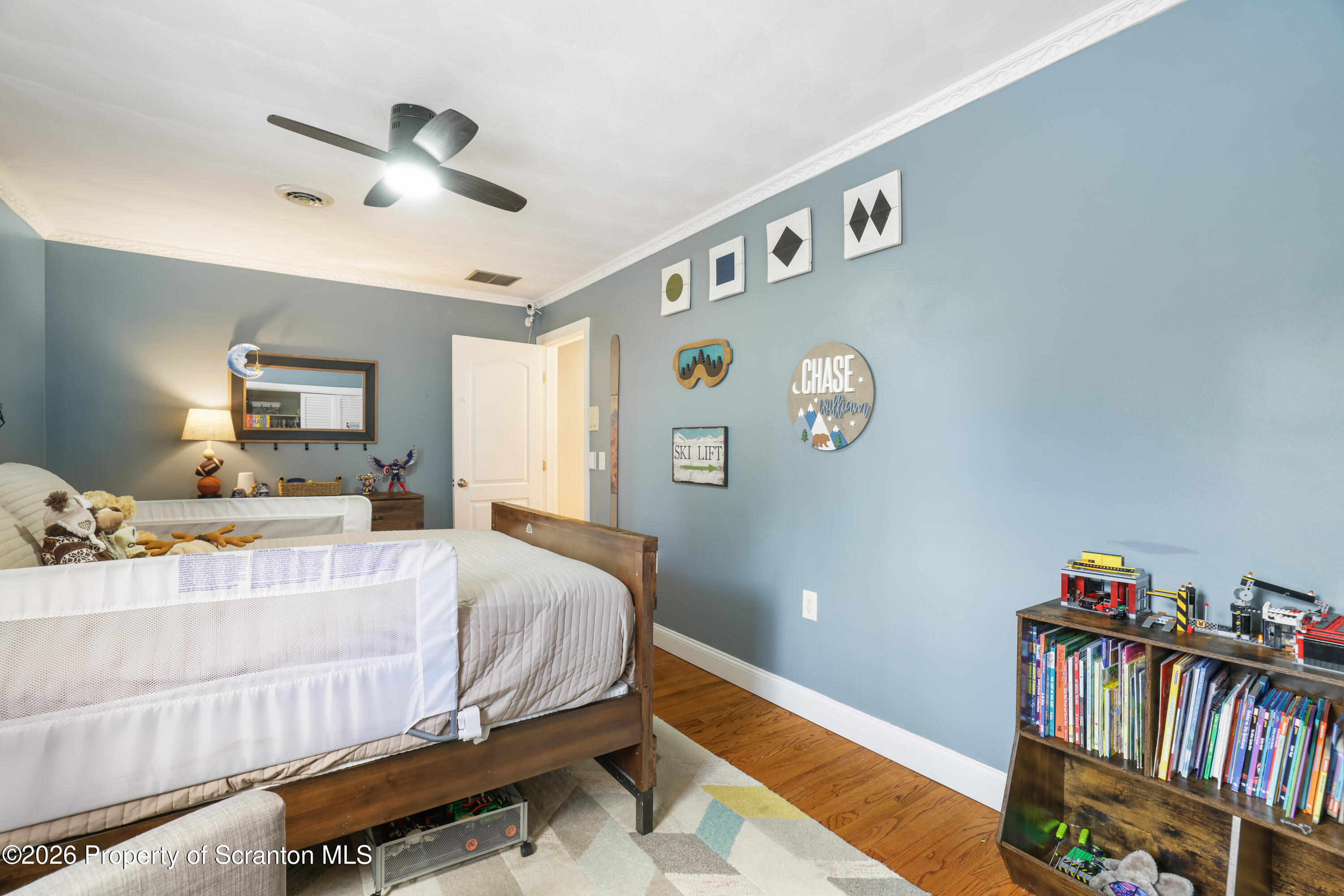 3 Old Mill Road Jermyn, PA 18433 - Photo 41 of 57 a bedroom with a bed and a book shelf