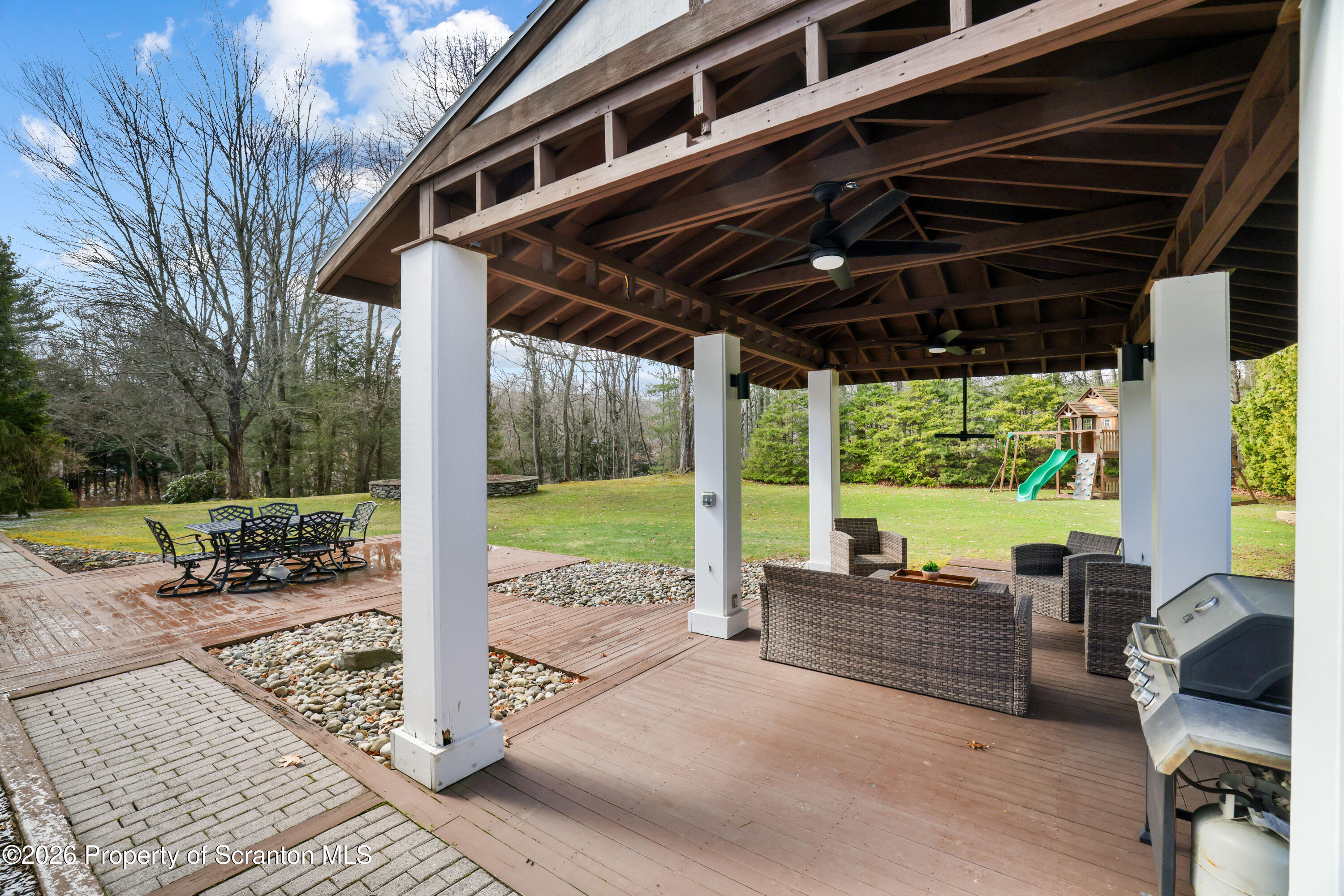 3 Old Mill Road Jermyn, PA 18433 - Photo 46 of 57 a view of a porch with furniture and backyard
