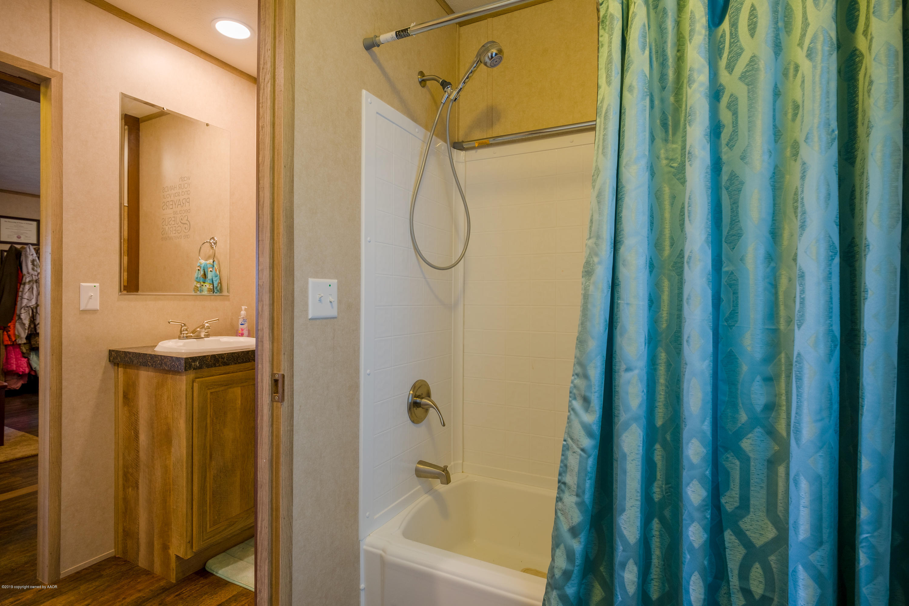 22300 Adkisson Road Canyon, TX 79015 - Photo 24 of 37 a bathroom with a shower