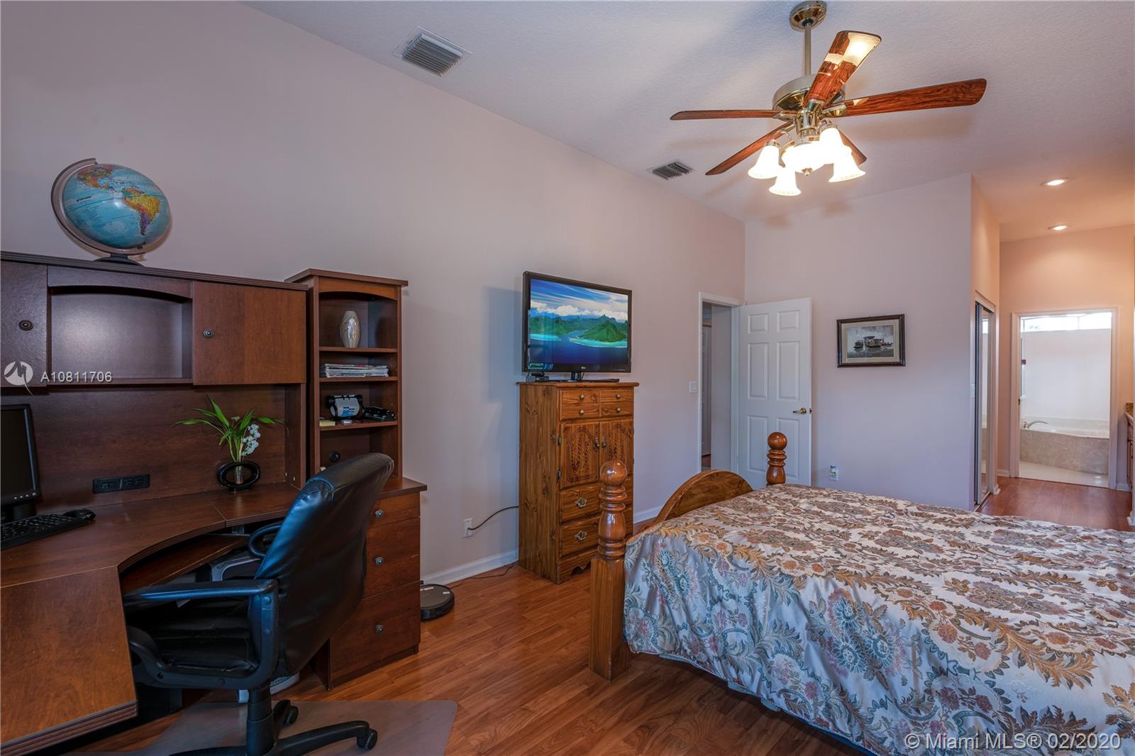 12420 Rockledge Circle Boca Raton, FL 33428 - Photo 21 of 44 Master Bedroom