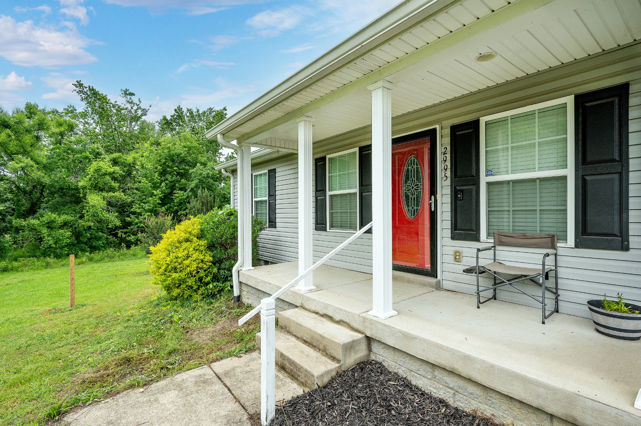 2995 Oak Grove Church Road Bethpage, TN 37022 - Photo 27 of 28 a view of house with outdoor seating and yard