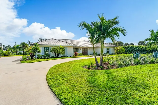 a house view with a garden space