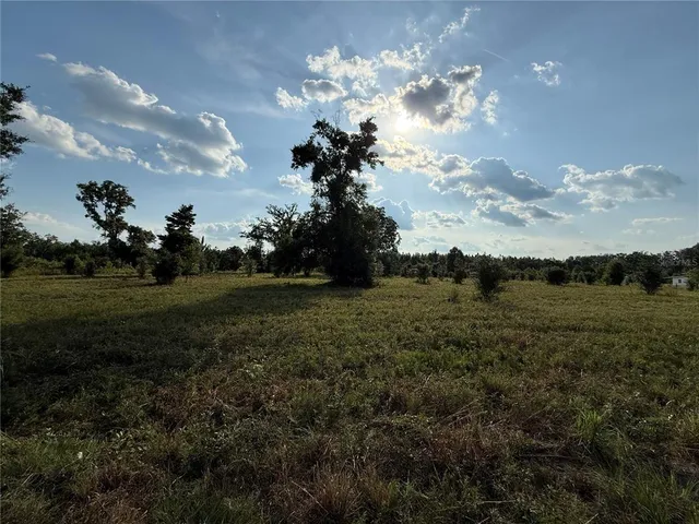 a view of a lake from a balcony