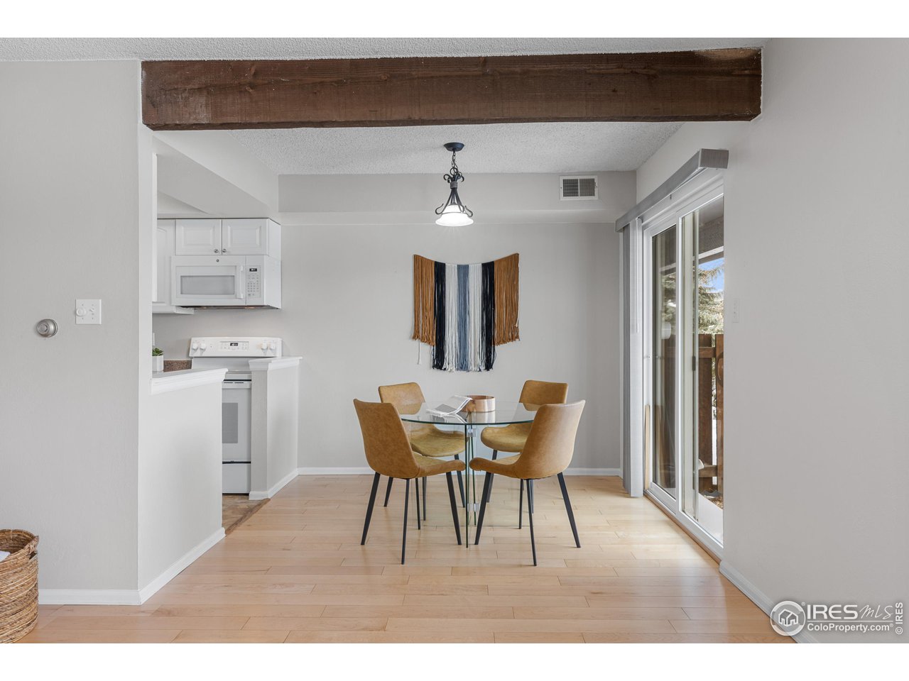 1170 Monroe Drive, Unit C Boulder, CO 80303 - Photo 3 of 14 a view of a dining room with furniture and window