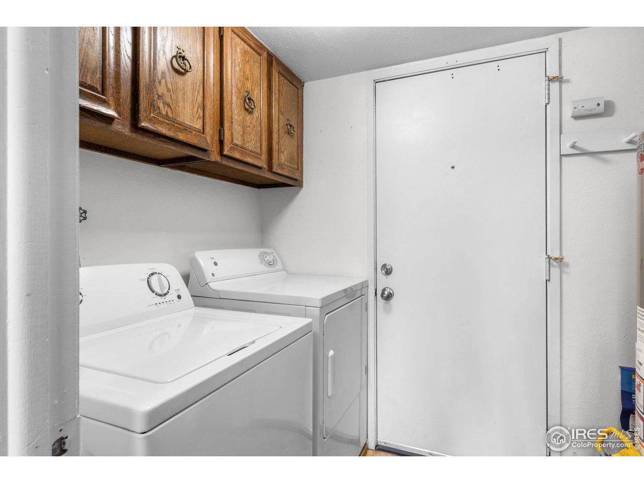 1170 Monroe Drive, Unit C Boulder, CO 80303 - Photo 7 of 14 a utility room with dryer and washer