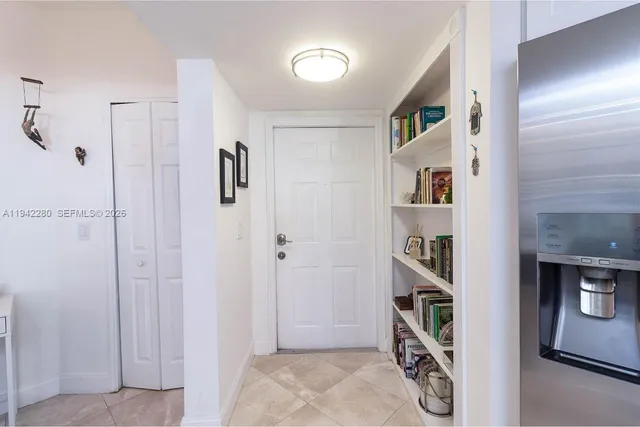 a view of a livingroom with shelves