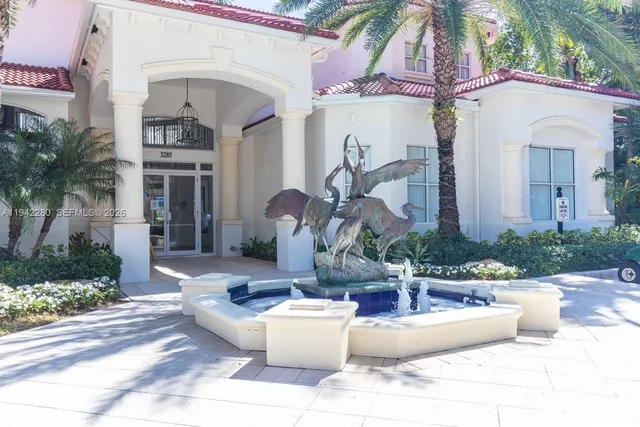 a view of a backyard with sitting area