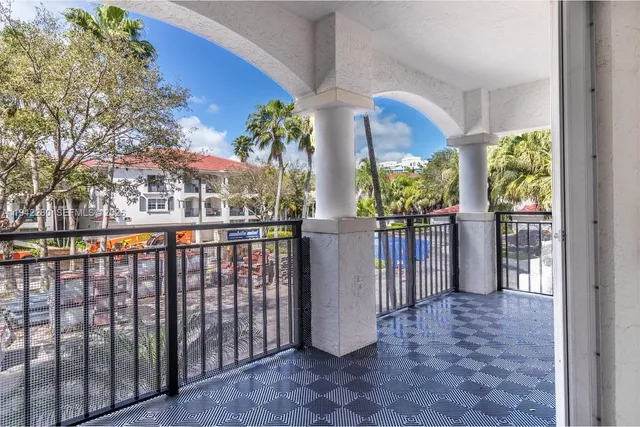 a view of a chairs and table in the patio