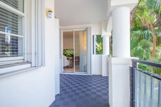 a view of a car parked in front of a house