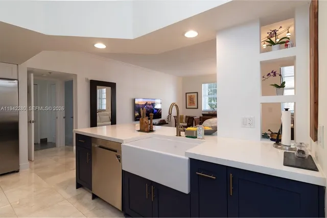 a view of living room with granite countertop furniture and a sink