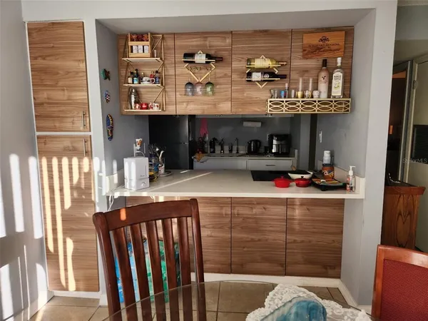 a room filled with furniture and a fireplace