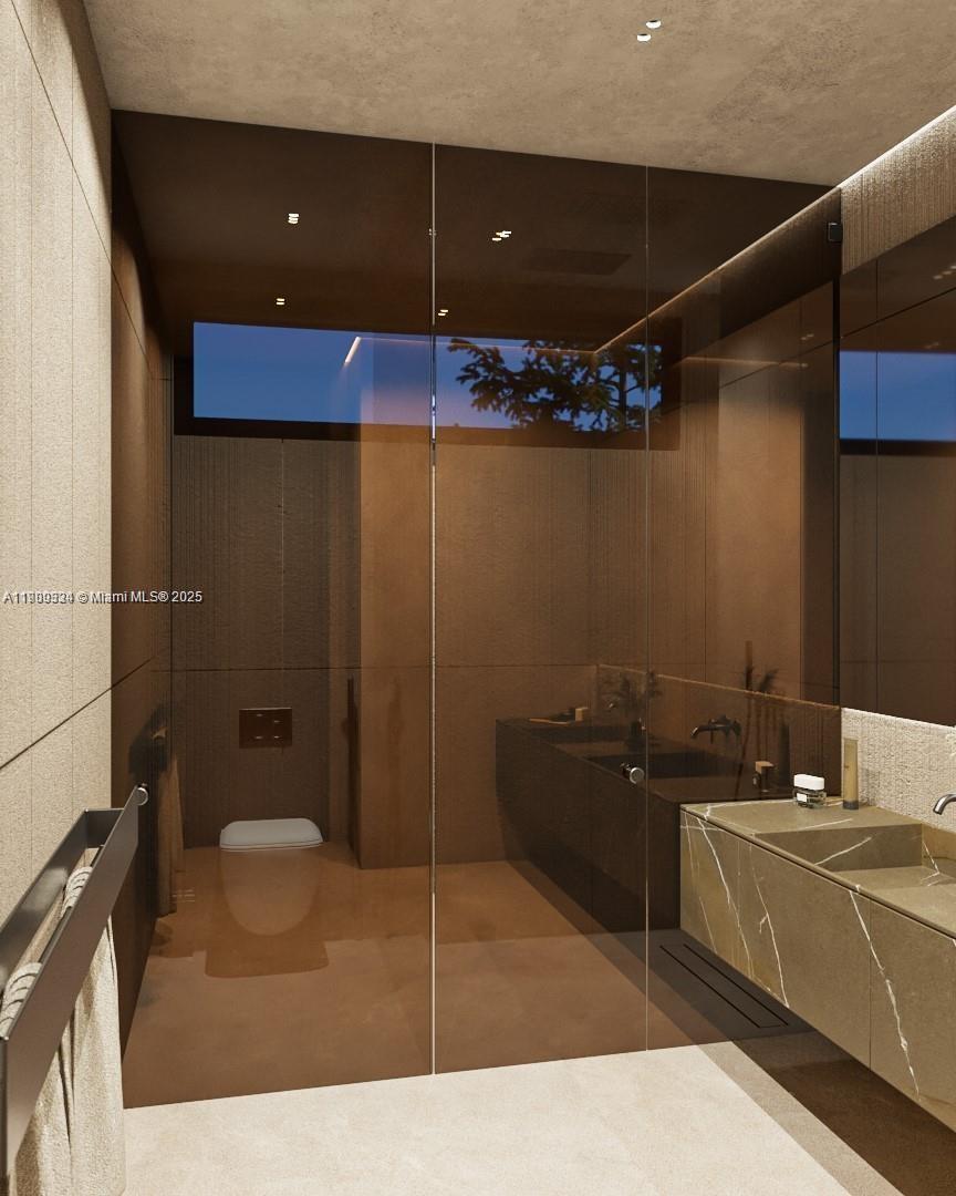 110 Hampton Lane Key Biscayne, FL 33149 - Photo 15 of 23 a bathroom with a sink and a mirror