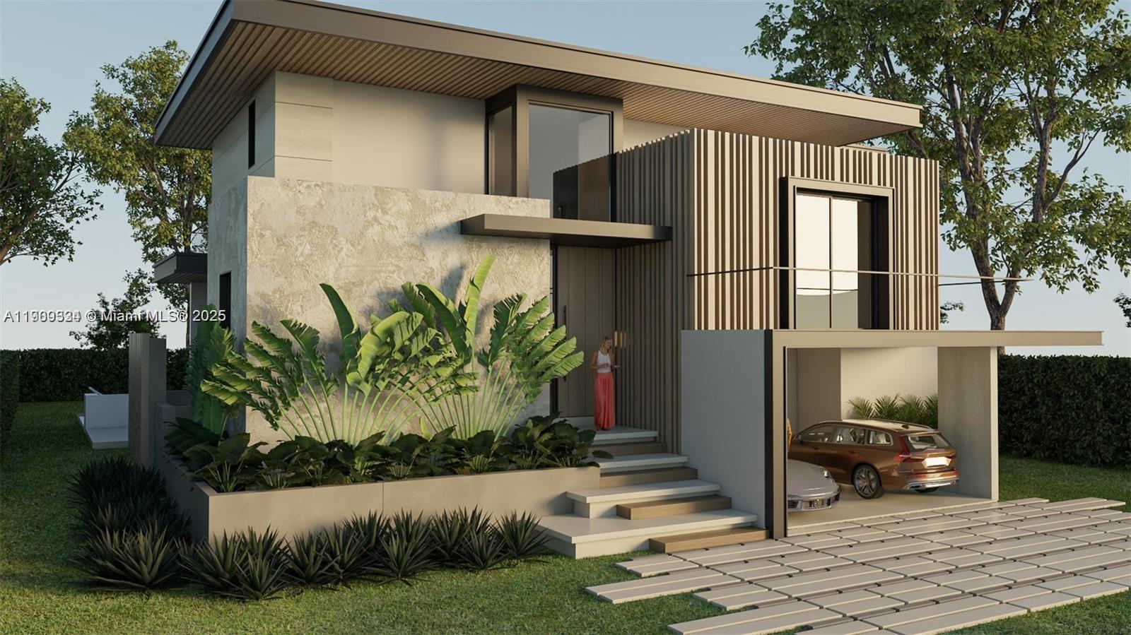 110 Hampton Lane Key Biscayne, FL 33149 - Photo 2 of 23 a front view of a house with garden