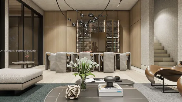 a living room with furniture flowerpot and a chandelier