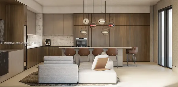 a kitchen with a refrigerator and table