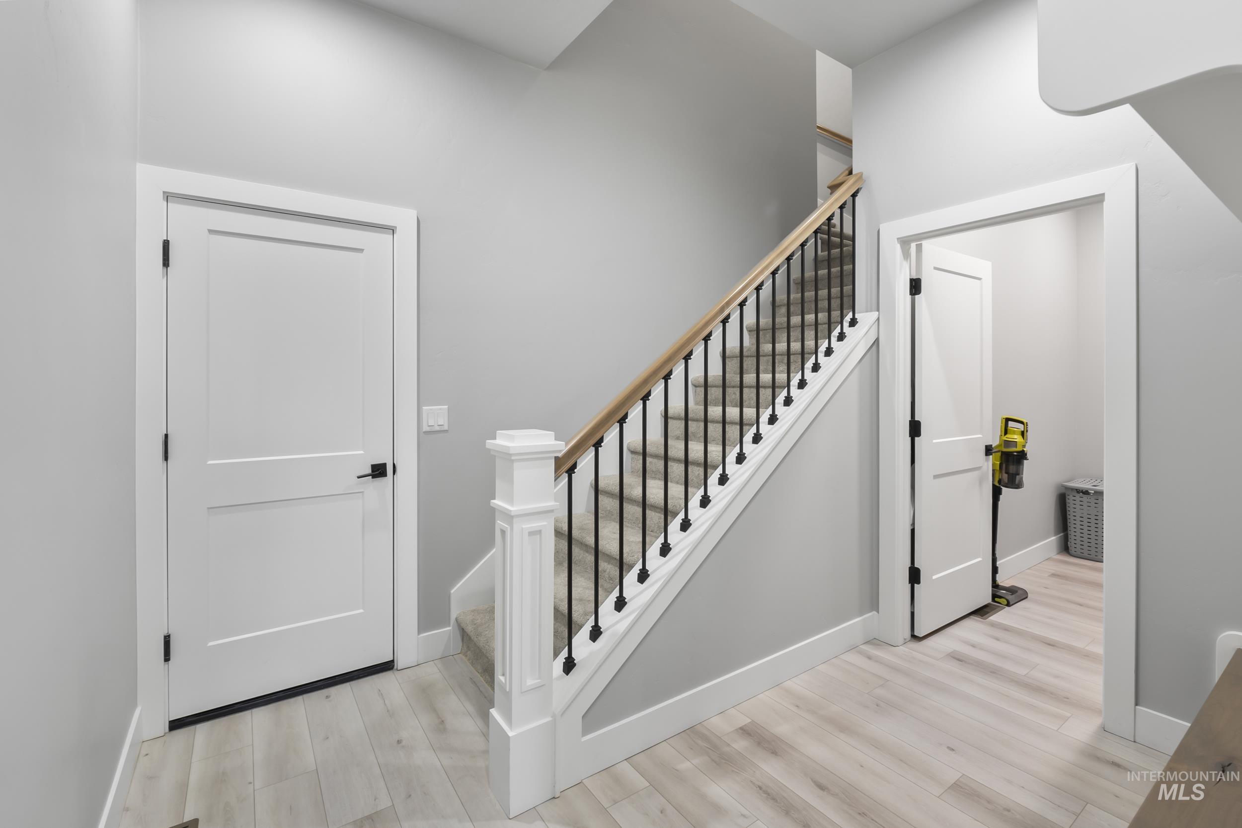 24696 Regal Road Middleton, ID 83644 - Photo 17 of 24 Staircase with wood finished floors and baseboards