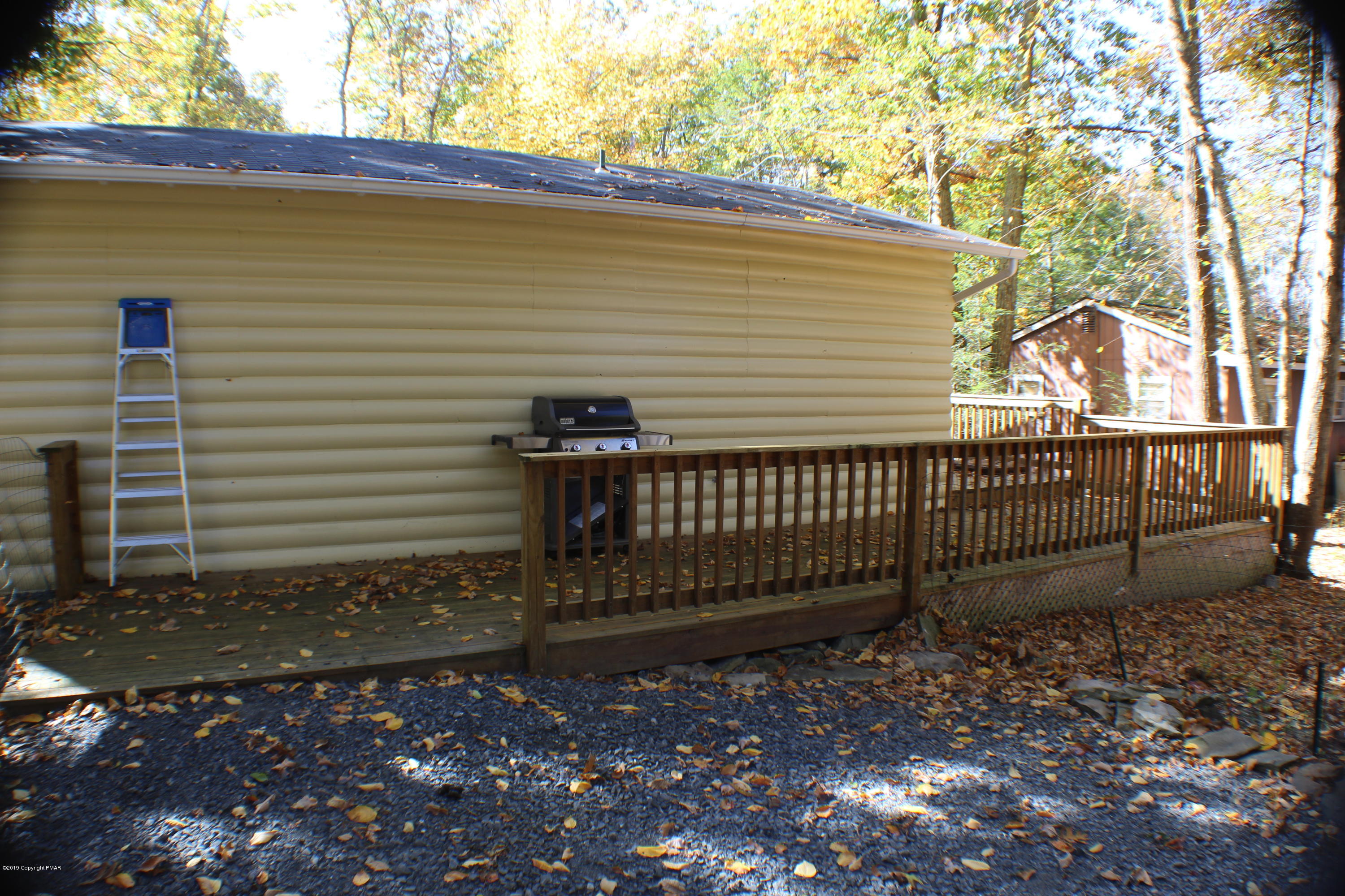 154 Morris Road East Stroudsburg, PA 18302 - Photo 4 of 17 a view of a yard with wooden fence