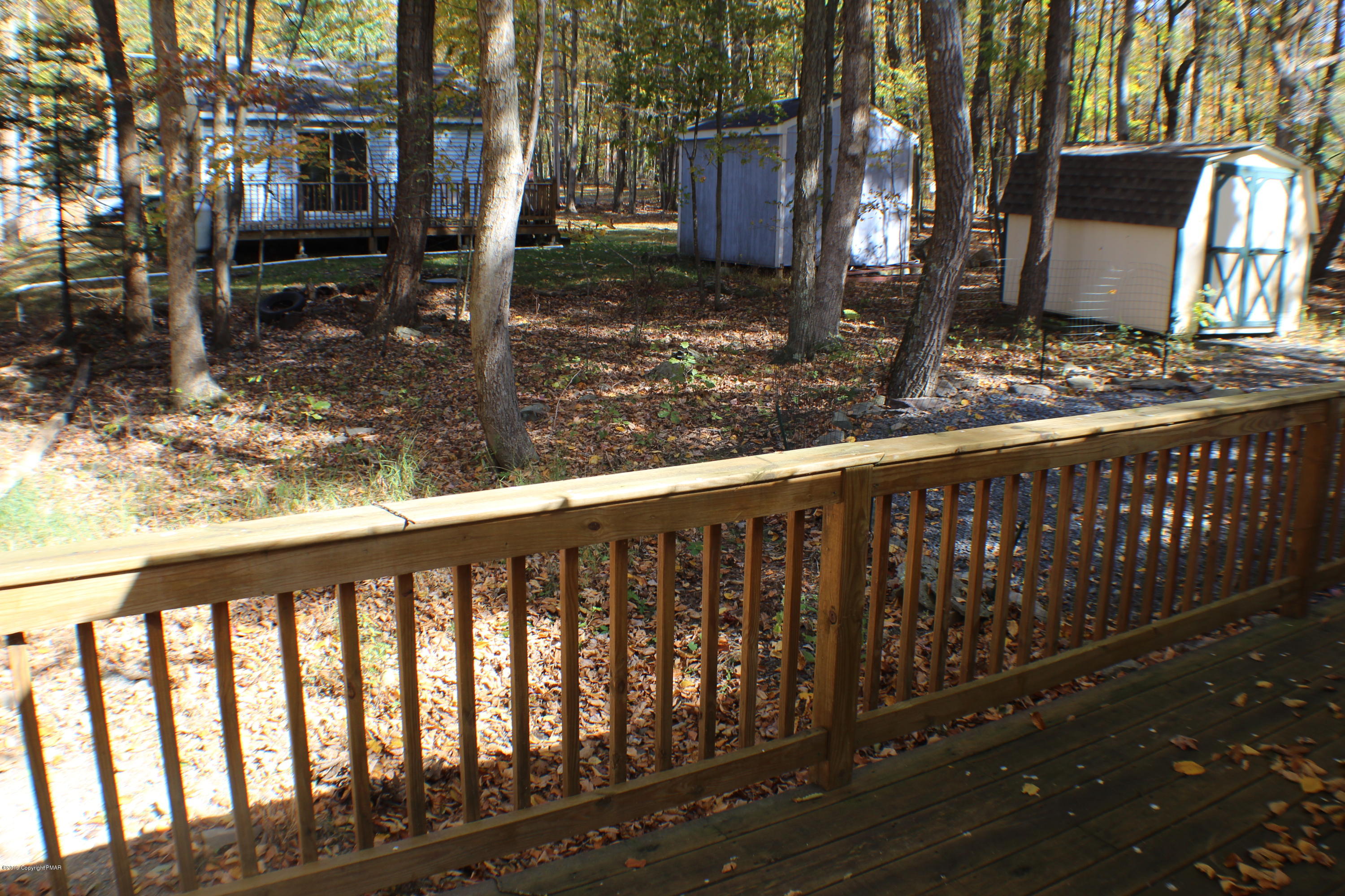 154 Morris Road East Stroudsburg, PA 18302 - Photo 6 of 17 a view of a wooden street from a balcony