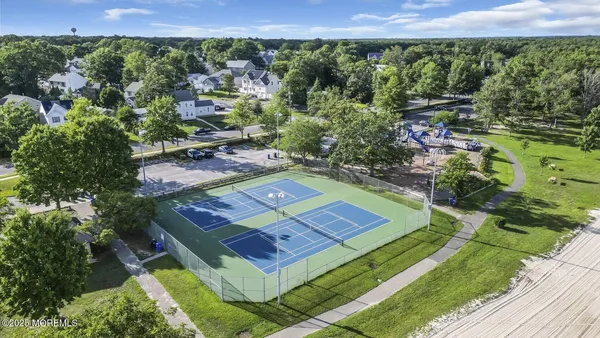 a view of a yard with an outdoor space
