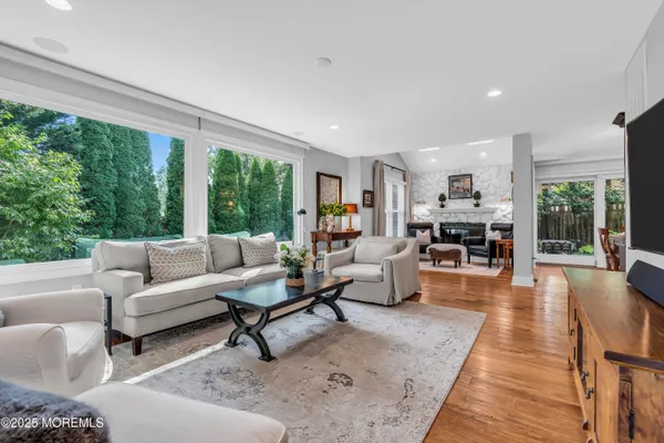 a living room with furniture and a table