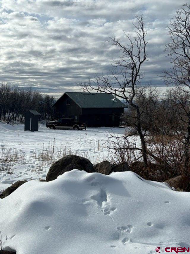 13 West Elk View Cedaredge, CO 81413 - Photo 28 of 31 a view of swimming pool with a yard