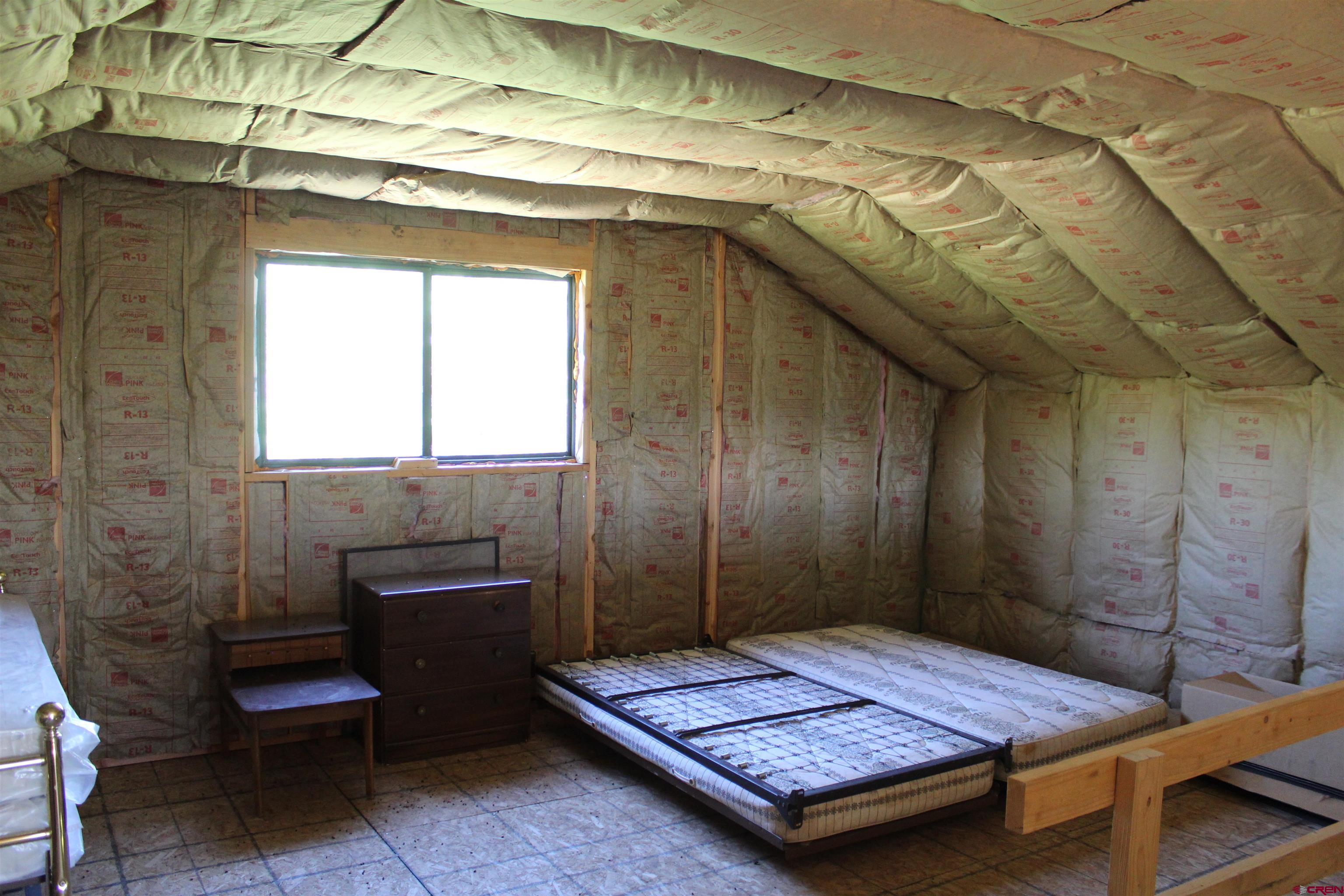 13 West Elk View Cedaredge, CO 81413 - Photo 9 of 31 a bath room with a table and a chair