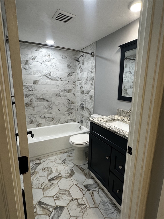 215 Belmont Avenue, Unit 1 Brockton, MA 02301 - Photo 20 of 30 a bathroom with a sink and a mirror