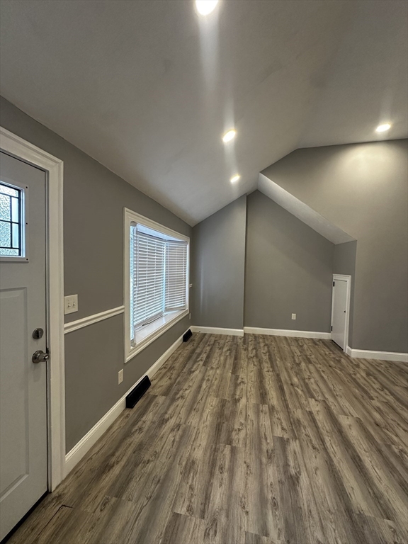 215 Belmont Avenue, Unit 1 Brockton, MA 02301 - Photo 4 of 30 a view of an empty room and window
