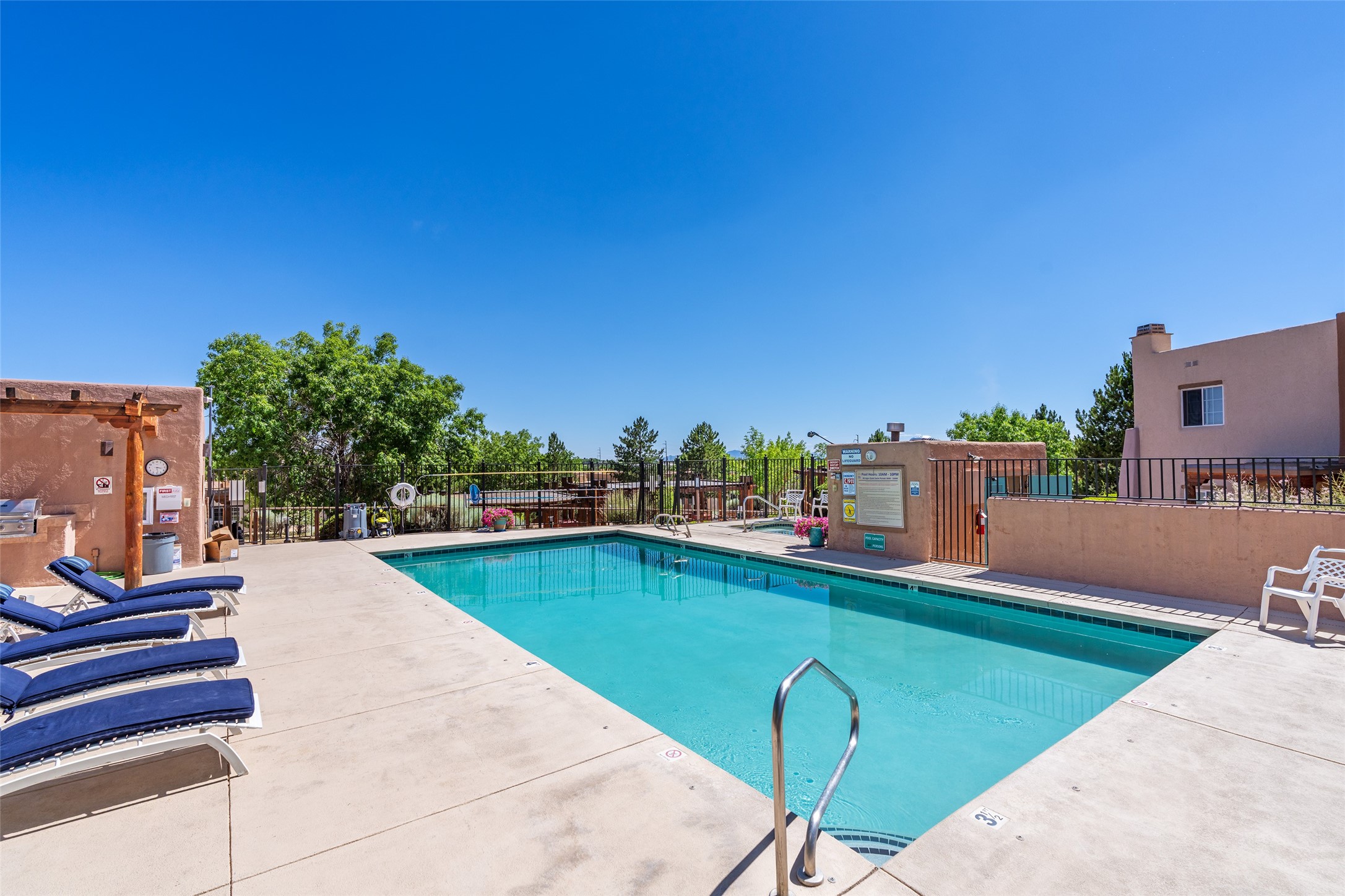 2210 Miguel Chavez Road, Unit 1423 Santa Fe, NM 87505 - Photo 23 of 26 saltwater pool