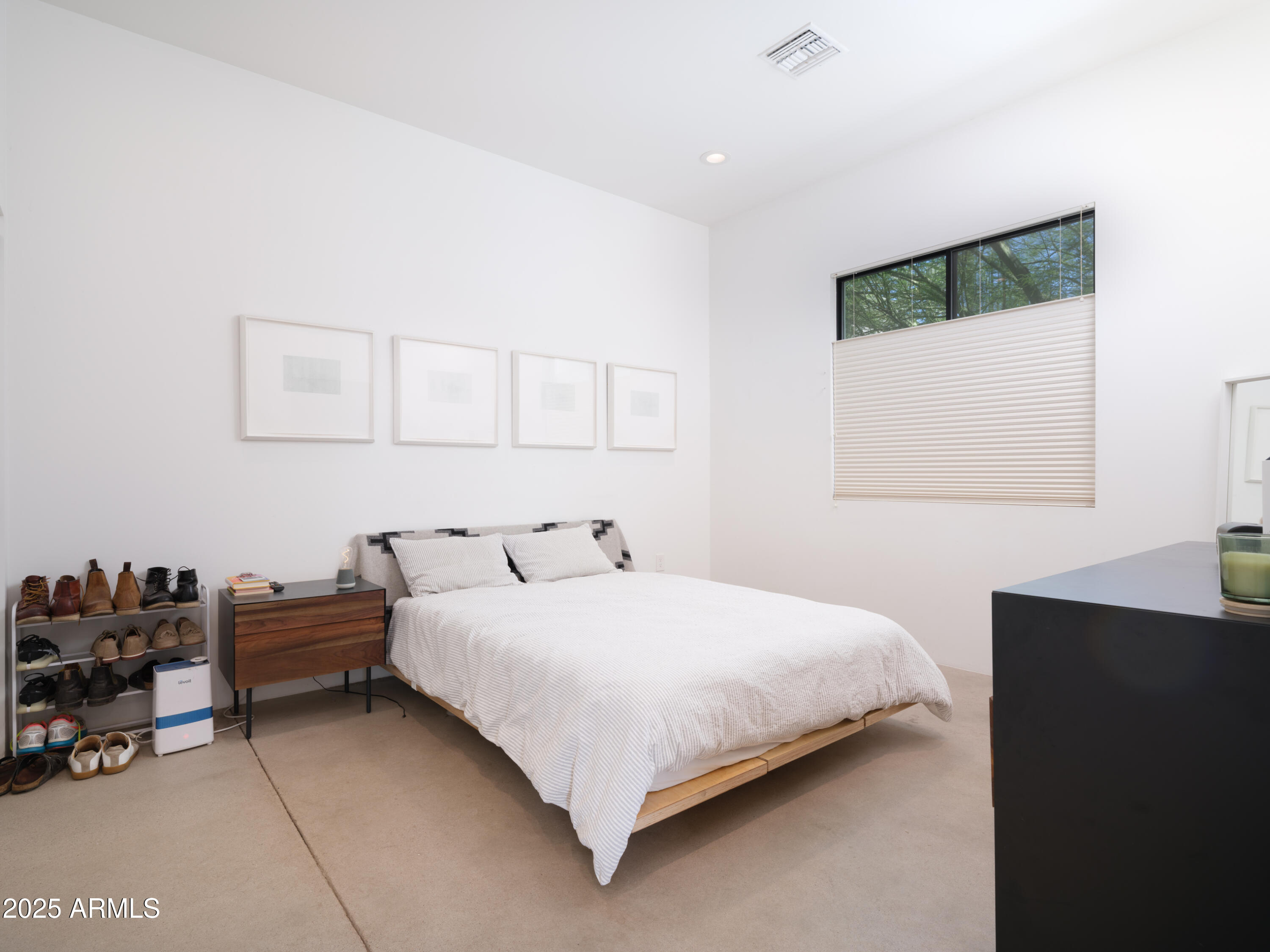 1526 East Coronado Road Phoenix, AZ 85006 - Photo 21 of 39 a bedroom with a bed and a window