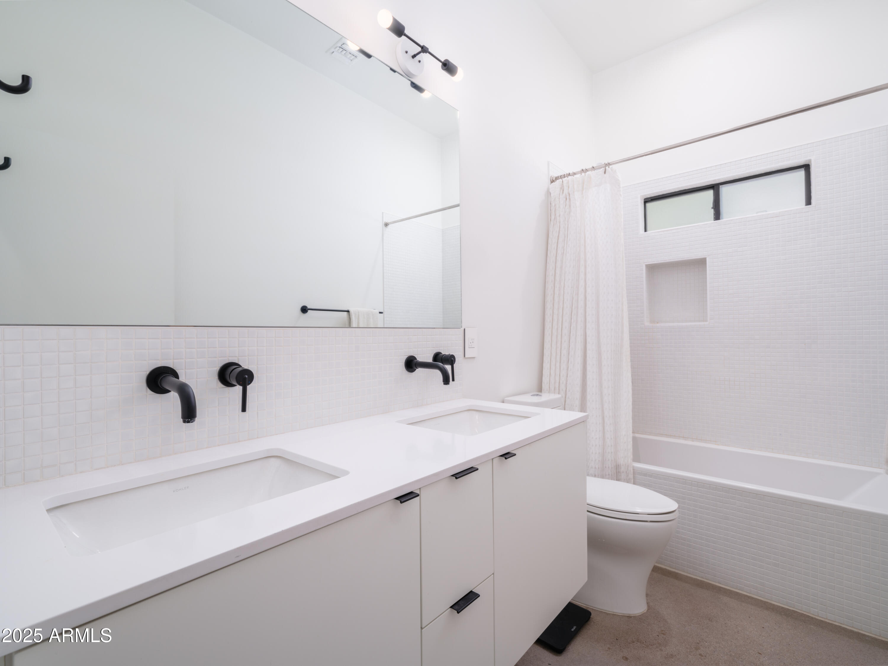 1526 East Coronado Road Phoenix, AZ 85006 - Photo 23 of 39 a bathroom with a sink a toilet and a shower